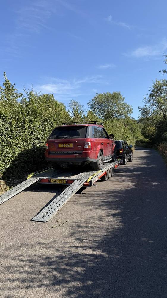 Range Rover Sport coming down the trailer ramps