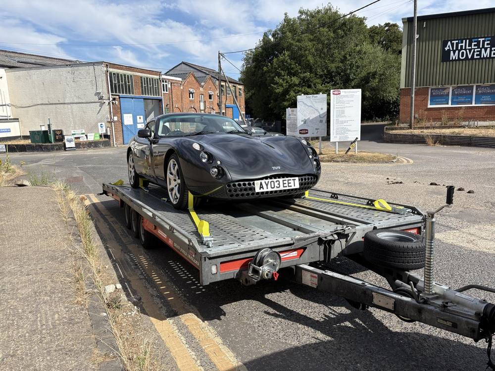 TVR sports car strapped for transport