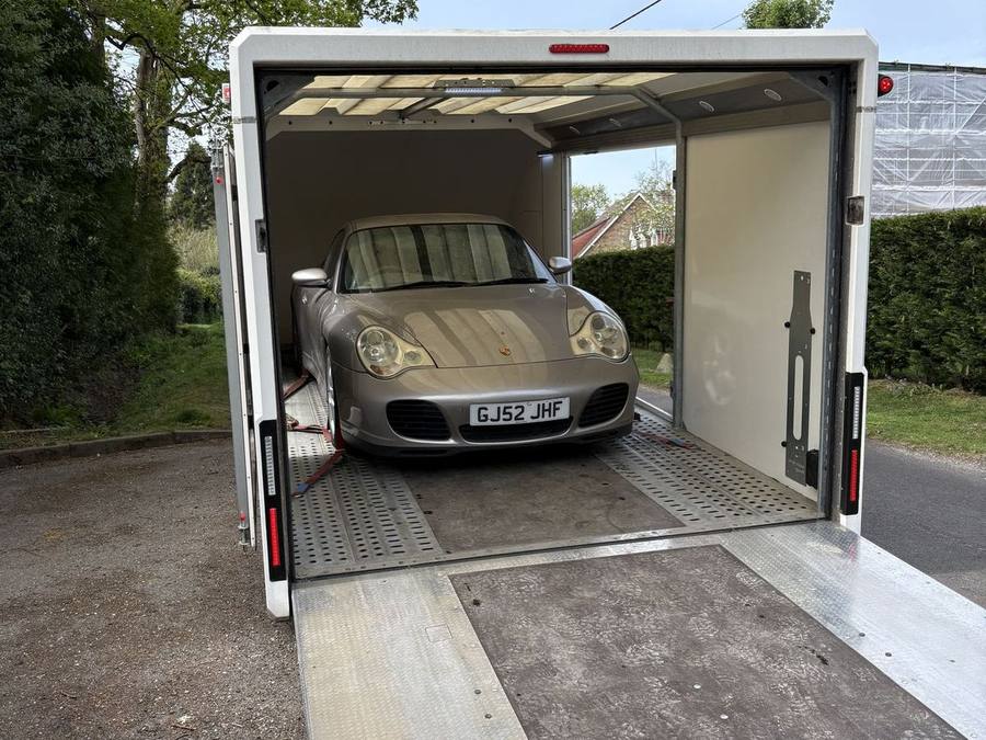 Porsche 911 loaded inside the Timeless Transport enclosed trailer
