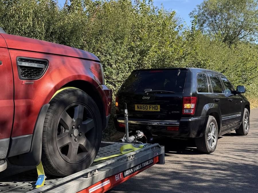 Range Rover loaded on the open Brian James trailer