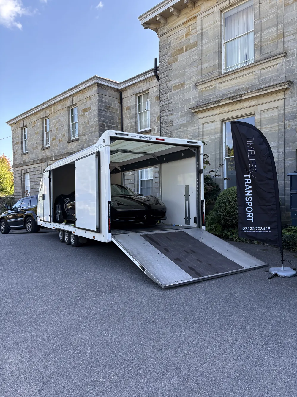 Timeless Transport enclosed trailer open outside a Sussex country house, ramp down